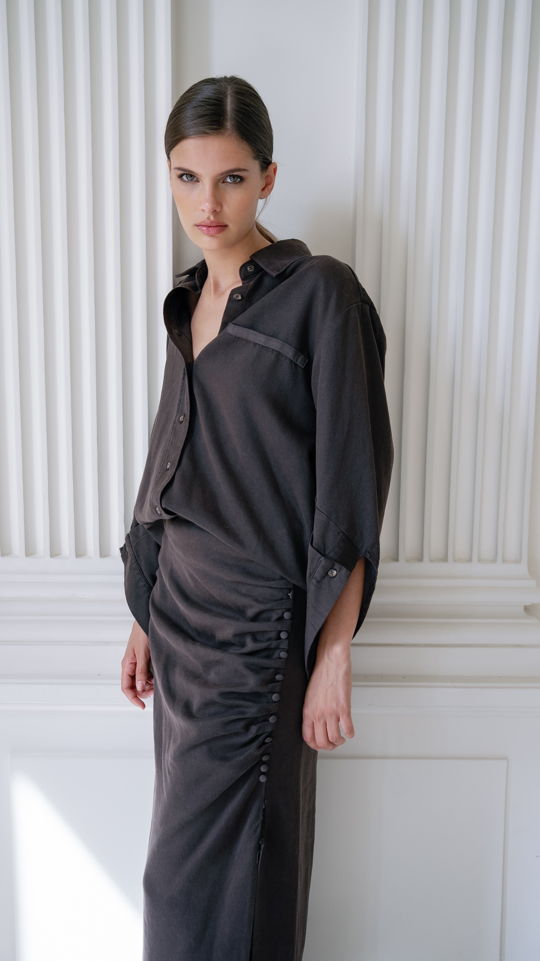 Mita is a short dress designed for the in-between season, with a unique twist. Wear it as a dress, or detach the shirt to transform it into a chic blazer